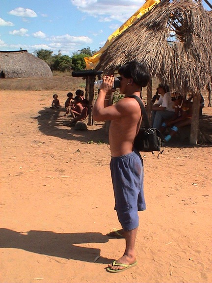 A young Awetí documenting the Tawarawana festival