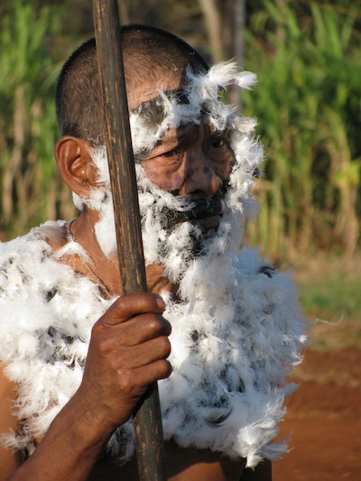 Man covered in feathers
