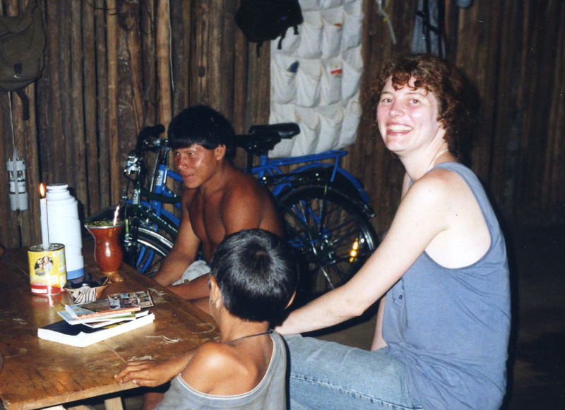 Sabine Reiter with younger Awetí at night in the researcher’s hut in the field