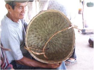 Baure man with the basket he made