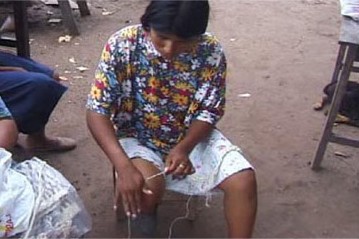 Wichi woman spinning chaguar