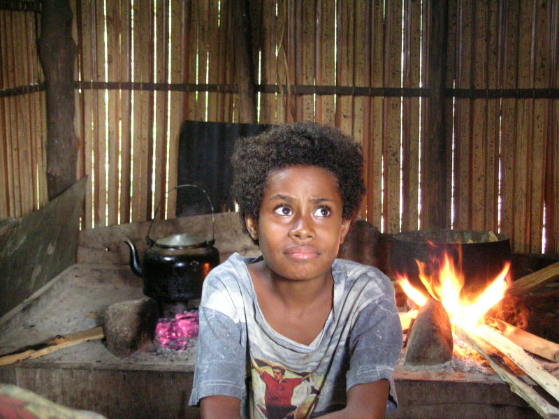 kid inside a hut